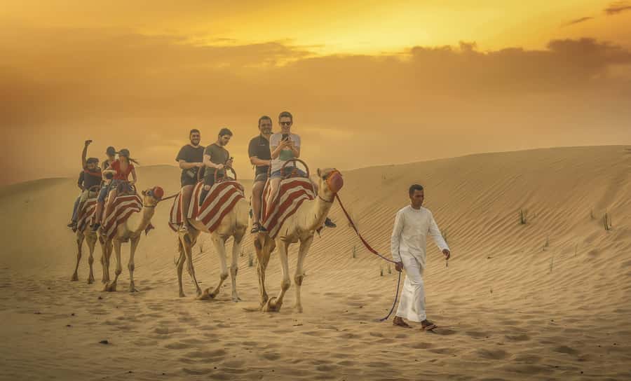 Dubai: Desert Safari, Quad Bike, Sandboarding, Camels & BBQ - The tire-pressure stop sets up the desert drive