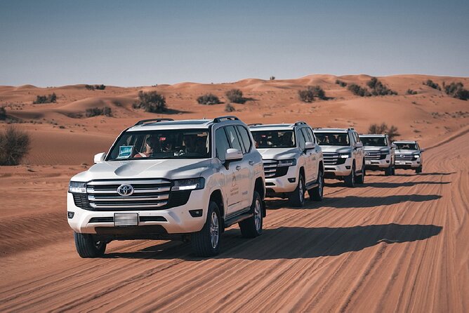 Dubai Desert Safari Thrill: Camel Ride, Live shows, BBQ & Spirits - Sunset photos and a slower change of pace