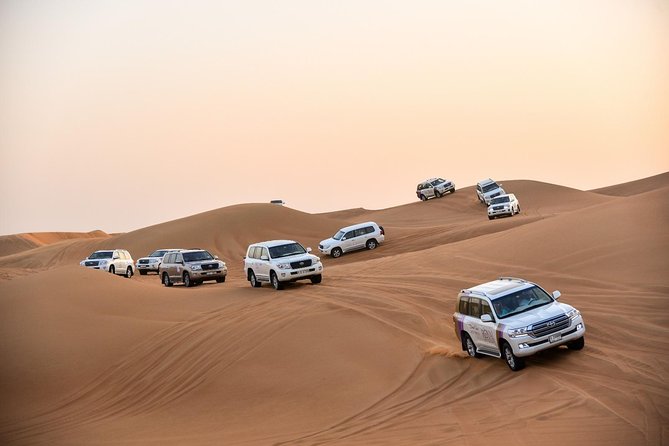 Dubai Desert Safari with BBQ And 4W Land Cruiser Dune Bashing Experience - The Land Cruiser dune-bashing ride
