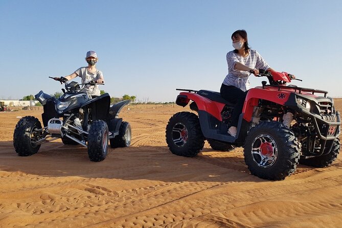 Dubai Desert Safari With BBQ, Quad Bike And Camel Ride - Camel riding and sandboarding keep the pace varied