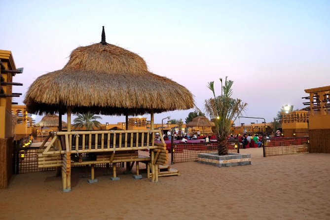Dubai Desert Safari with Dune Bashing, Camel Rides & BBQ - Sandboarding and camel rides