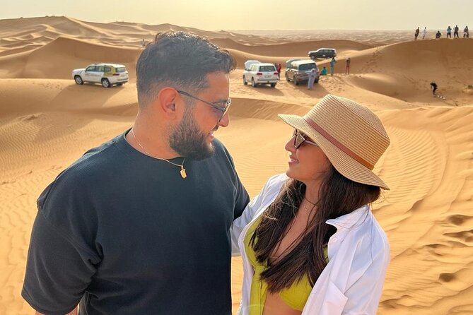 Dubai Desert Safari with Quad Bike, Camel Ride, Dinner and Show - Dune bashing, with a clear comfort warning