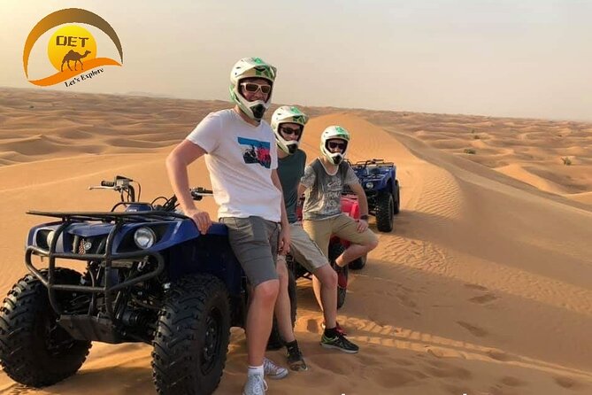 Dubai Desert Safari with Quad Bike, sandboarding, live show & BBQ - Quad biking across the sand