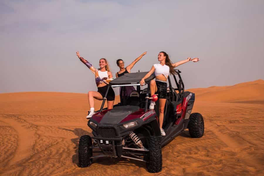 Dubai: Dune Buggy Desert Safari, Camel Ride & Sandboarding - Sandboarding after the engine noise