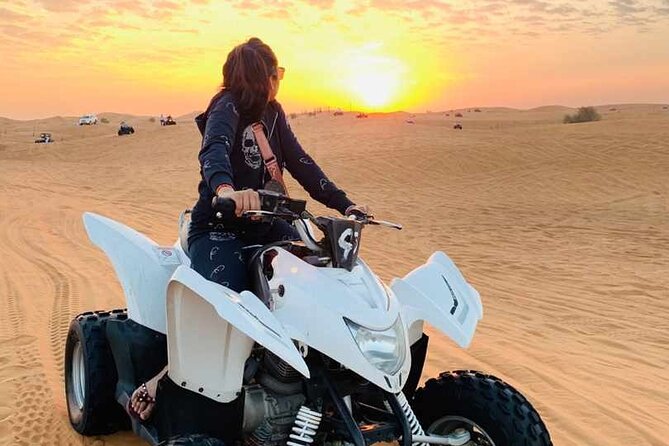 Dubai Dunes Safari With Quad Bike, Camel Ride, BBQ Dinner & Live Shows - Belly dance, tanura, and fire performances