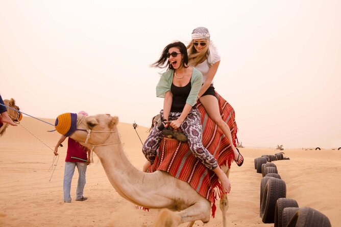 Dubai Evening 4x4 Desert Safari ATV Bike ,Camel Ride , BBQ Dinner - Four shows keep the camp lively