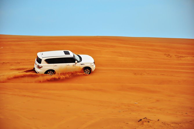 Dubai Evening 4x4 Desert Safari, Shows, Camel Ride BBQ Dinner - Leaving Dubai for the red dunes