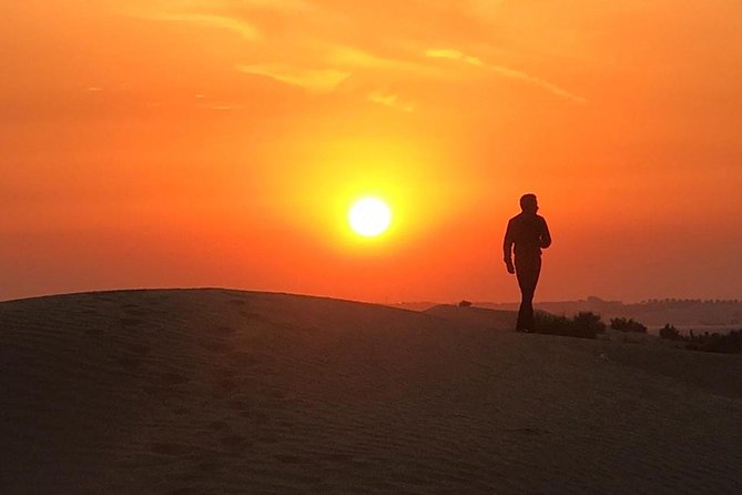 Dubai Evening 4x4 Desert Safari, Shows, Camel Ride BBQ Dinner - Camel ride, henna, shisha, and costume photographs