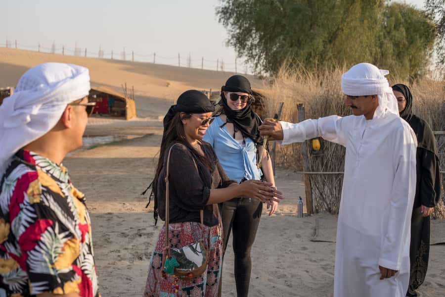 Dubai: Evening Camel Trekking & Dinner at Al Marmoom Oasis - Evening entertainment after dinner