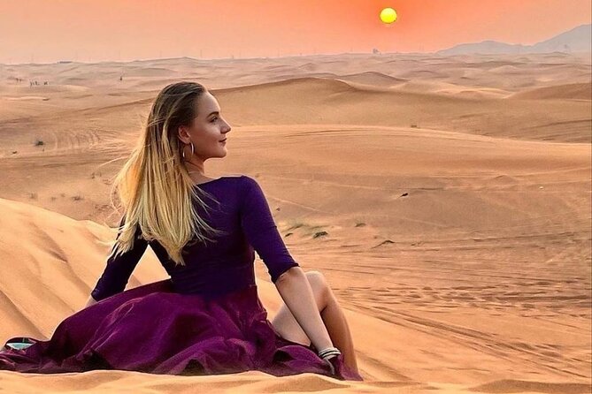 Dubai Evening Desert Safari & BBQ Dinner - Sandboarding on the red dunes