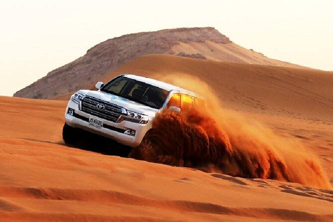 Dubai Evening Desert Safari With BBQ Dinner at Arabian Heritage - From Dubai streets to Lahbab’s red dunes