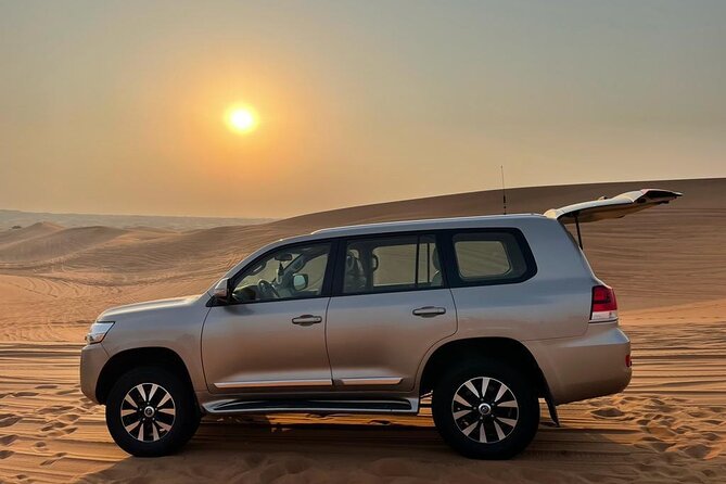 Dubai Evening Desert Safari With Transfers Dune Bashing & Dinner - Belly dance, Tanoura, fire, and shisha