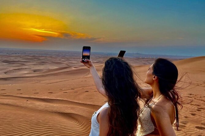 Dubai Evening Desert Safari With Transfers Dune Bashing & Dinner - Dune bashing and the sunset stop