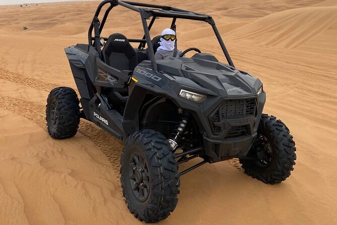 Dubai: Extreme Red Dune Buggy Desert Safari Adventure - Handling the 1000cc buggy across the dunes