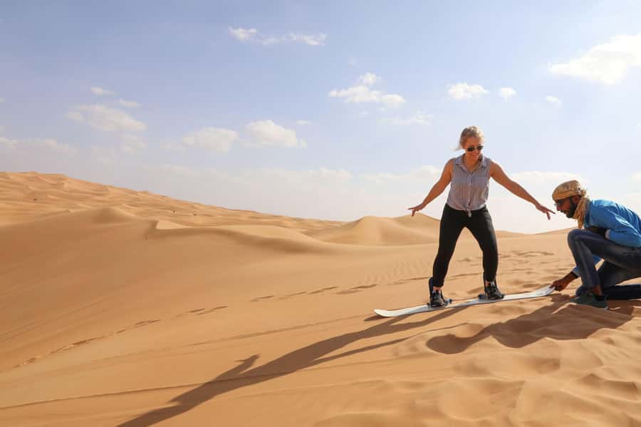 Dubai: Helicopter Ride, Desert Safari, Camels & Refreshments - A short camel ride and a falcon experience