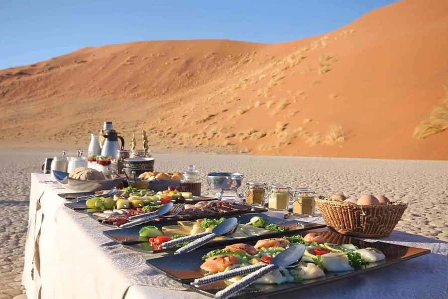 Dubai: Hot Air Balloon with Camel, ATV, & Horse Ride Options - Landing, refreshments, and the 20-minute transfer