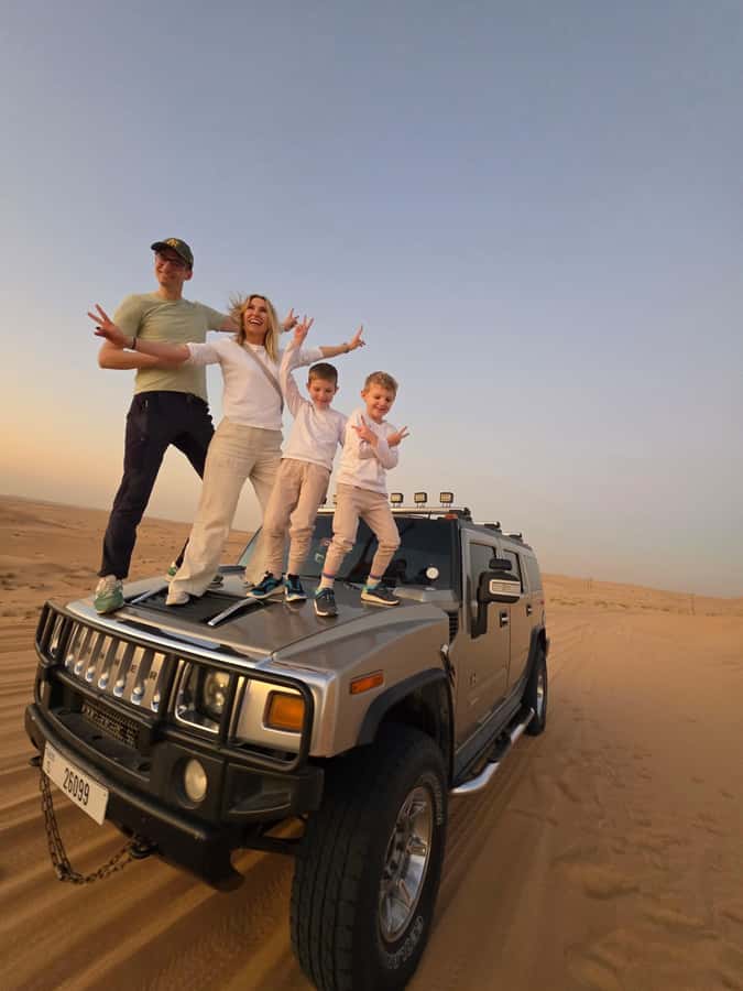 Dubai Hummer Safari Adventure & Traditional Dress Photoshoot - Sandboarding and the short camel ride