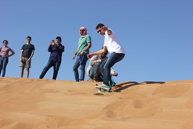 Dubai: Jeep Desert Safari, Camel Ride, and Quad Bike Tour - Sandboarding, photos, and a change of pace