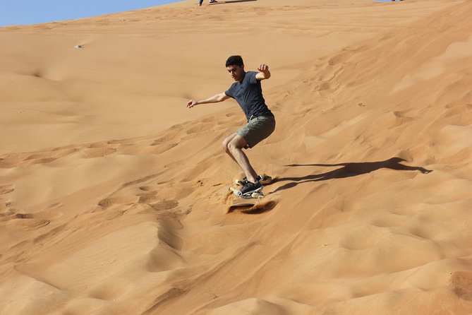 Dubai: Jeep Desert Safari, Camel Ride, and Quad Bike Tour - Dune bashing in a rugged 4x4
