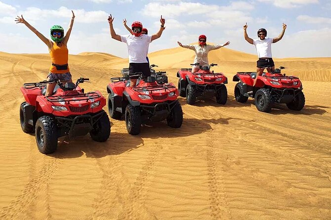 Dubai: Jeep Desert Safari, Camel Ride, and Quad Bike Tour - Quad biking across Lahbab