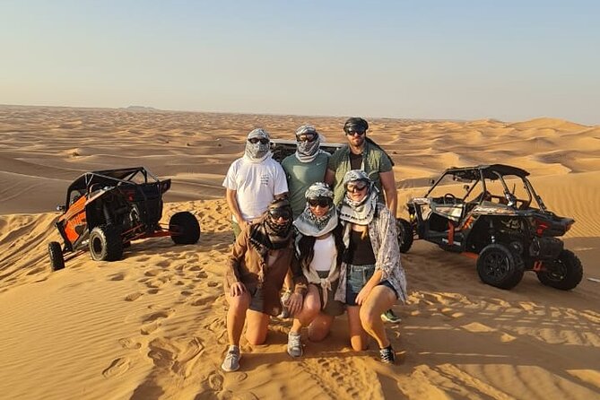Dubai Morning Buggy Dunes Safari with Sandboarding & Camel Ride - Sandboarding on the high dunes