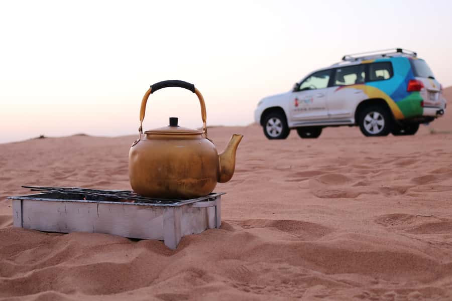 Dubai: Morning Desert Safari with Camel Ride & Sandboarding - Dune bashing: exciting, short, and not for everyone
