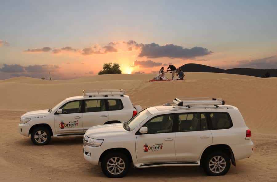 Dubai: Morning Desert Safari with Camel Ride & Sandboarding - The drive to Lahbab and the first desert views