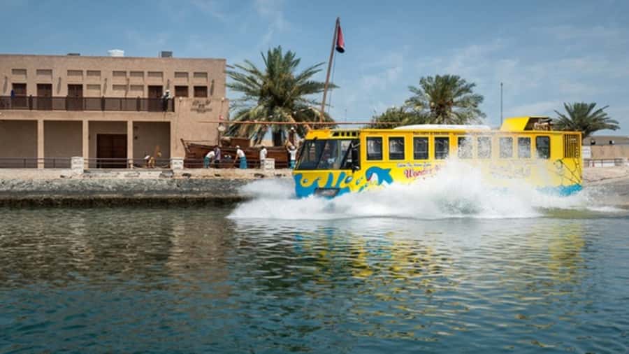 Dubai: Old town tour with Wonder Bus, souks, Creek and Guide - The textile market and Heritage Village
