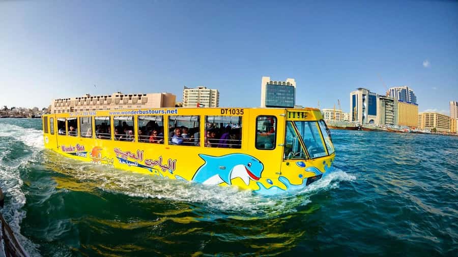Dubai: Old town tour with Wonder Bus, souks, Creek and Guide - What the guide adds to the ride