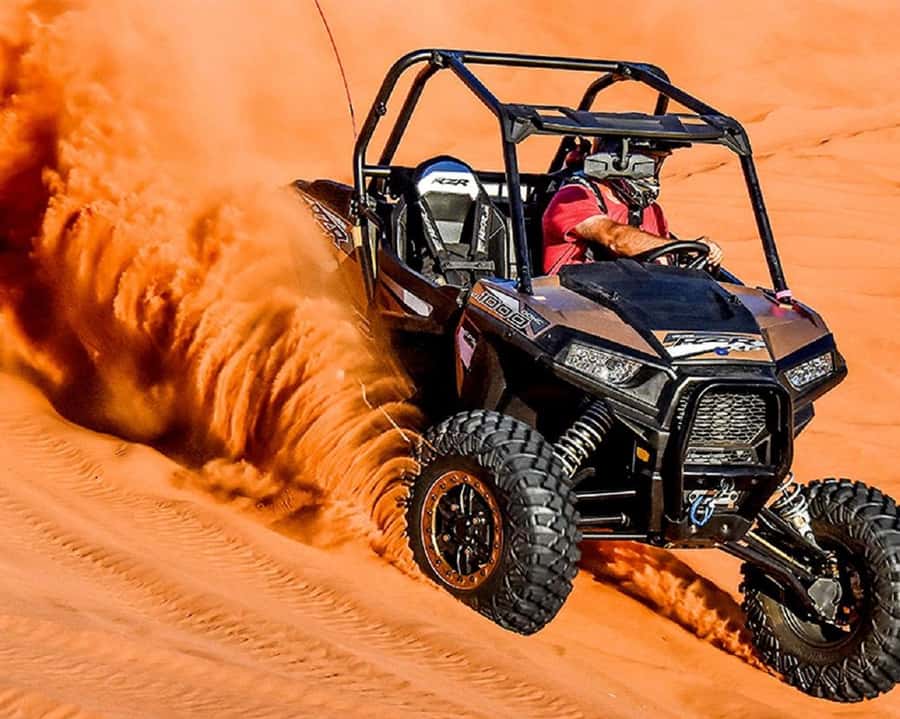Dubai: Polaris RZR and Sandboarding Desert Adventure - Taking the wheel of the Polaris RZR 1000 CC