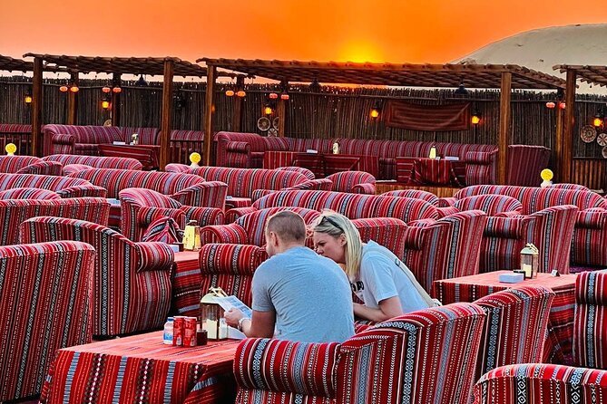 Dubai Premium Desert Safari – Live Buffet Dinner & Luxury Camp - Sandboarding adds a short, easy challenge