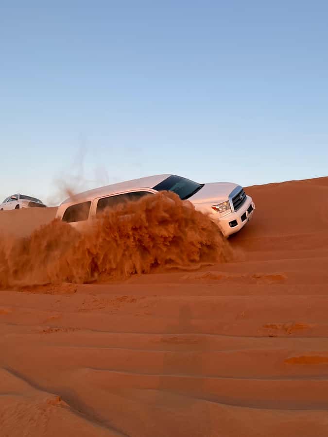 Dubai: Premium Red Dune Safari with Sandboarding & BBQ - Forty minutes of dune bashing in a 4WD