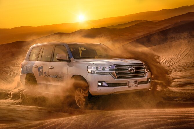 Dubai Premium Red Dunes Safari, Camels & 5<em> BBQ at Al Khayma camp – Why Lahbab’s red dunes make a difference’ /></p>
<p><p>The safari begins with a drive of roughly an hour from Dubai, Sharjah, or Ajman, depending on your pickup point. Your English-speaking licensed driver handles the 4WD transfer and usually provides commentary about Dubai, its buildings, palaces, and rapid growth along the way. Rashid Mir, Yusir, Abid Wahid, Sunil, Shams, Sarg, and Tofeeq Abbas are among the guides praised for being informative, funny, careful, and helpful with photographs.</p>
</p>
<p><p>Lahbab is the reason to choose this trip over a basic desert outing. Its red dunes rise in broad waves, giving the dune drive a stronger sense of place and making the sunset stop more photogenic. The sandboarding break lets you get out of the vehicle and try the dunes yourself, though you should wear sports shoes for a safer footing.</p>
</p>
<p><p>The first stop also has facilities for freshening up before the main activities. If you have selected the ATV option, this is where you ride a quad bike. The ATV is not part of the standard price, and it carries separate responsibility for injuries, damage, and lost items. I would treat it as an optional extra, not a required part of the safari.</p>
</p>
<div class="twil" style="margin: 20px 0; padding: 15px 0;"><p>More BBQ Dinner Safaris in the Desert:</p><ul style="margin: 10px 0; padding-left: 0; list-style: none;"><li style="margin: 0 0 12px 0; padding: 0 0 12px 0; border-bottom: 1px solid #FAEEE1; line-height: 1.4;"><a href="https://theemiratesexplorer.com/dubai-red-dune-safari-quad-bike-camel-ride-bbq-dinner/">Dubai: Red Dune Safari, Quad Bike, Camel Ride, BBQ Dinner</a><br><span style="font-size: 0.82em; color: #555;"><span style="color: #D9822B;">★</span> 4.9 &nbsp;&middot;&nbsp; 32,185 reviews</span></li><li style="margin: 0 0 12px 0; padding: 0 0 12px 0; border-bottom: 1px solid #FAEEE1; line-height: 1.4;"><a href="https://theemiratesexplorer.com/dubai-red-dunes-atv-camels-stargazing-5-bbq-al-khayma-camp/">Dubai Red Dunes ATV, Camels, Stargazing & 5* BBQ Al Khayma Camp</a><br><span style="font-size: 0.82em; color: #555;"><span style="color: #D9822B;">★</span> 5.0 &nbsp;&middot;&nbsp; 21,620 reviews</span></li><li style="margin: 0; padding: 0; border-bottom: none; line-height: 1.4;"><a href="https://theemiratesexplorer.com/dubai-desert-safari-with-bbq-dinner-quad-biking-options/">Dubai: Desert Safari with BBQ Dinner & Quad Biking Options</a><br><span style="font-size: 0.82em; color: #555;"><span style="color: #D9822B;">★</span> 4.9 &nbsp;&middot;&nbsp; 20,485 reviews</span></li></ul></div><h2>Dune bashing and sandboarding in a shared 4WD</h2>
<p><img width="669" height="446" decoding="async" src=