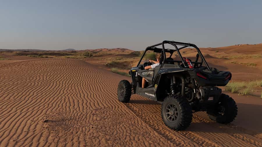 Dubai: Private Dune Buggy, Camel Ride, and Sand Boarding! - Sandboarding adds a short burst of fun