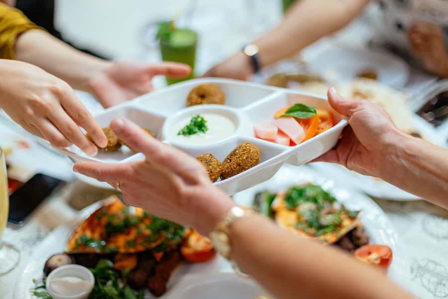 Dubai: Private Food Tour – 10 Tastings with Locals - Dates and falafel set the tone