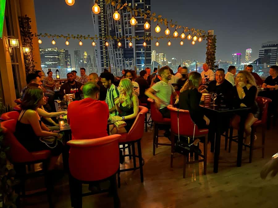 Dubai: Pub Crawl Nightlife Tour - The private bus is part of the entertainment