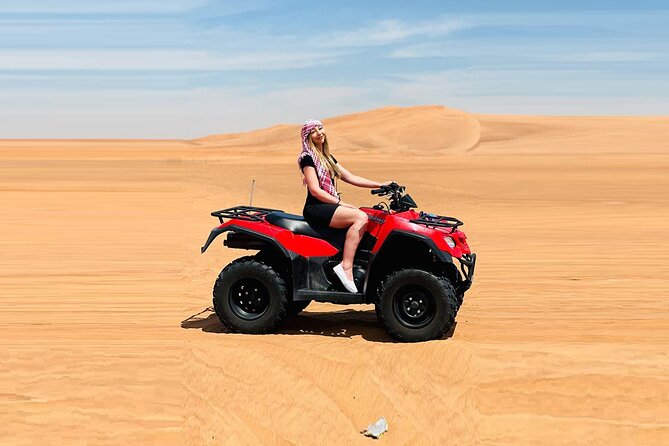 Dubai: Quad Bike Safari, Camels, & Camp with BBQ Dinner - One hour on a quad bike in the red dunes
