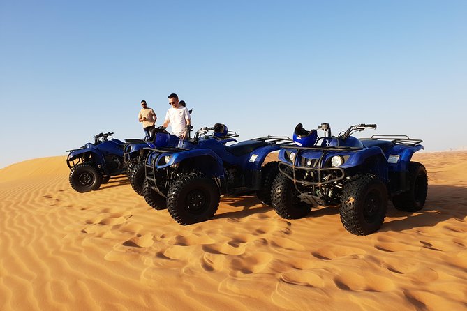 Dubai: Quad Bike Safari, Camels, & Camp with BBQ Dinner - Sunset and the Bedouin-style camp
