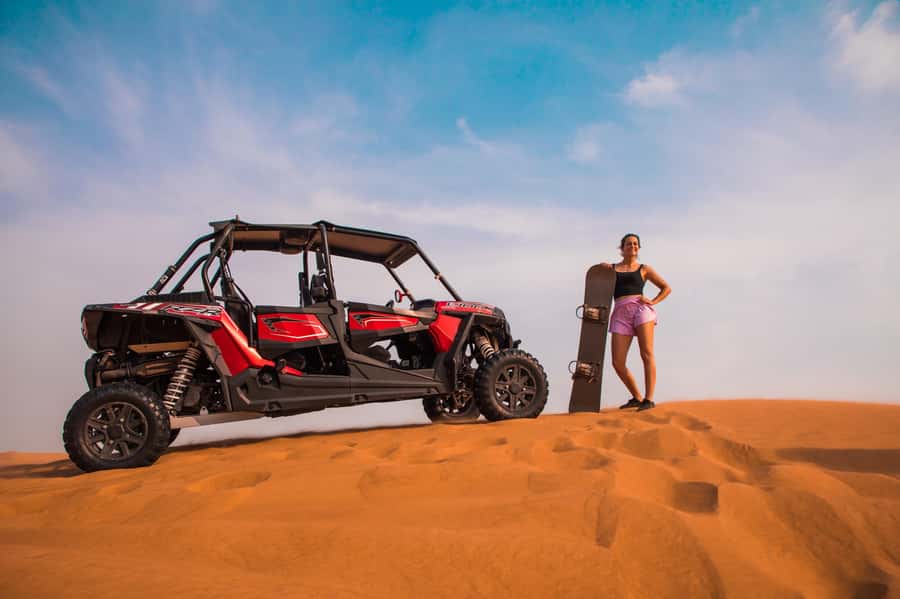 Dubai: Red Dune Desert Safari, Quad Bike, Camels, and BBQ - Sandboarding and sunset photos on the red dunes