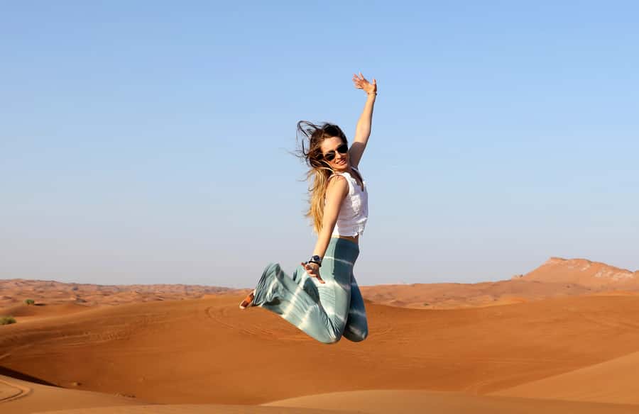 Dubai: Red Dune Desert Safari, Quad Bike, Camels, and BBQ - Camel riding, tea, dates, and a slower pace