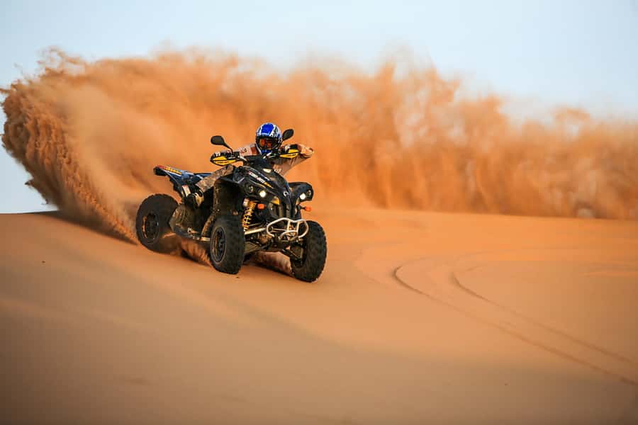 Dubai: Red Dune Safari, Quad Bike, Camel Ride, BBQ Dinner - Quad biking adds a separate burst of speed