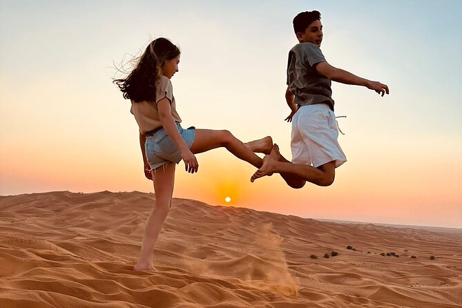 Dubai Red Dune Safari with Bedouin BBQ Dinner & Hotel Transfers - A short camel ride and a falcon encounter