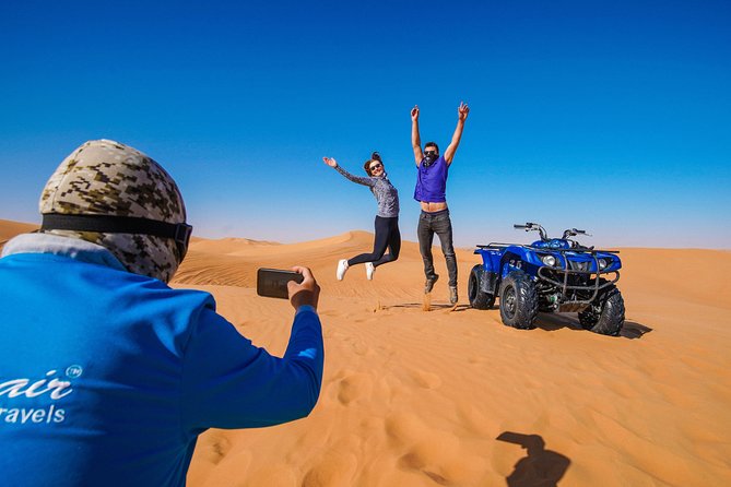 Dubai Red Dunes ATV, Camels, Stargazing & 5<em> BBQ Al Khayma Camp – Key points to know before booking’ /></p>
<ul>
<li><strong>The ATV ride is the main event:</strong> You get about 60 minutes on the red dunes, with helmets, fuel, an instructor, and a safety briefing included.</li>
<li><strong>Al Khayma Camp adds a full evening program:</strong> Expect Arabic coffee, dates, camel riding, henna for women, falcon photos, shisha, dinner, shows, and stargazing.</li>
<li><strong>The price covers a lot:</strong> At about $88 per person, hotel transfers, food, drinks, equipment, and listed activities are included.</li>
<li><strong>This is self-driving, not dune bashing:</strong> A guide leads the ATV group, but you control the vehicle. Damage and injuries are your responsibility.</li>
<li><strong>Choose your time carefully:</strong> The 11:30 a.m. departure includes lunch but not the fire show or stargazing.</li>
<li><strong>Prepare for heat and sand:</strong> Wear loose clothing and sturdy sneakers, drink plenty of water, and bring a jacket in winter.</li>
</ul>
<h2>Red dunes, roaring engines, and a packed desert evening</h2>
<p> BBQ Al Khayma Camp – Red dunes, roaring engines, and a packed desert evening’ /></p>
<p><p>This experience works best for you if you want more than a standard 4×4 desert safari. Instead of sitting in a vehicle for most of the adventure, you spend a full hour driving your own quad bike across Lahbab’s red-orange dunes, then move to a large desert camp for dinner and entertainment.</p>
</p>
<p><p>The setup is practical. Pickup is offered from addresses in Dubai, Sharjah, and Ajman, with extra charges possible for some locations. You’ll usually be collected about 45 minutes before the selected departure time, so keep your phone nearby and be ready in the hotel lobby.</p>
</p>
<p><p>The group size is capped at 15 people, which helps keep the ATV session manageable. This is not a private tour, but it is more personal than a huge convoy. Your guide drives the support vehicle, explains the route, helps with photos, and checks that you are coping with the heat and sand.</p>
</p>
<p><p>The experience has a strong 5.0 rating from more than 21,000 ratings, with 99 percent recommending it. That high score makes sense if you want a convenient package rather than a quiet, minimalist desert outing. It also explains why dates can fill well ahead of time, with bookings made an average of 24 days before departure.</p>
</p>
<div class="twil" style="margin: 20px 0; padding: 15px 0;"><p>More stargazing nights out of the Desert:</p><ul style="margin: 10px 0; padding-left: 0; list-style: none;"><li style="margin: 0 0 12px 0; padding: 0 0 12px 0; border-bottom: 1px solid #FAEEE1; line-height: 1.4;"><a href="https://theemiratesexplorer.com/dubai-sunset-camel-trek-al-khayma-camp-stargazing-bbq/">Dubai: Sunset Camel Trek, Al Khayma Camp, Stargazing & BBQ</a><br><span style="font-size: 0.82em; color: #555;"><span style="color: #D9822B;">★</span> 4.8 &nbsp;&middot;&nbsp; 2,588 reviews</span></li><li style="margin: 0 0 12px 0; padding: 0 0 12px 0; border-bottom: 1px solid #FAEEE1; line-height: 1.4;"><a href="https://theemiratesexplorer.com/dubai-overnight-safari-dinner-stargazing-al-khayma-camp/">Dubai: Overnight Safari, Dinner, Stargazing & Al Khayma Camp</a><br><span style="font-size: 0.82em; color: #555;"><span style="color: #D9822B;">★</span> 4.8 &nbsp;&middot;&nbsp; 2,562 reviews</span></li><li style="margin: 0; padding: 0; border-bottom: none; line-height: 1.4;"><a href="https://theemiratesexplorer.com/dubai-overnight-desert-safari-bbq-stargazing-at-al-khayma-camp/">Dubai Overnight Desert Safari, BBQ & Stargazing at Al Khayma Camp</a><br><span style="font-size: 0.82em; color: #555;"><span style="color: #D9822B;">★</span> 5.0 &nbsp;&middot;&nbsp; 2,327 reviews</span></li></ul></div><h2>The drive from Dubai to Lahbab</h2>
<p><img width="669" height="446" decoding="async" src=