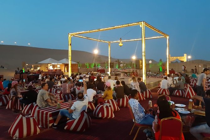 Dubai Red Dunes Desert Safari : Sandboarding, BBQ & Live Shows - Sandboarding and the short camel ride