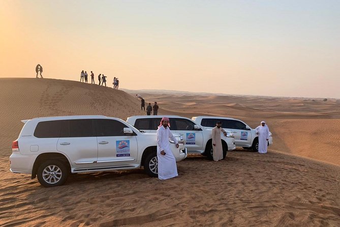Dubai Red Dunes Desert Safari : Sandboarding, BBQ & Live Shows - Sunset photos before the camp