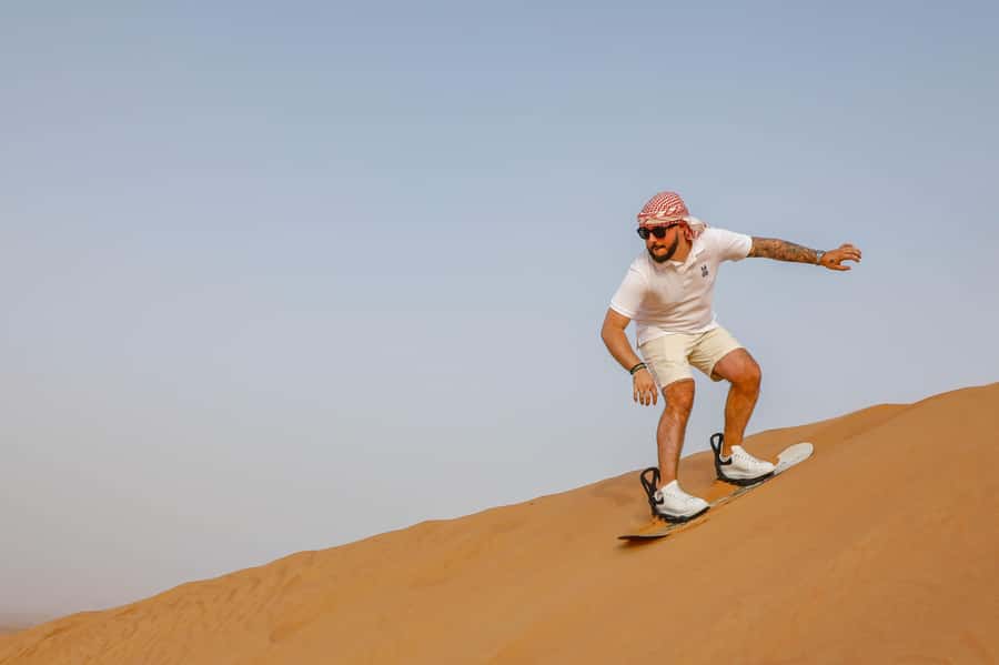 Dubai: Red Dunes Quad Bike with Sandboarding, Camels and BBQ - Key points to know before booking