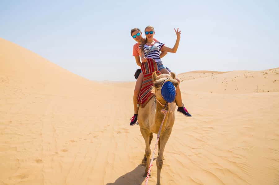 Dubai: Red Dunes Quad Bike with Sandboarding, Camels and BBQ - Red dunes, red faces, and a full seven-hour outing
