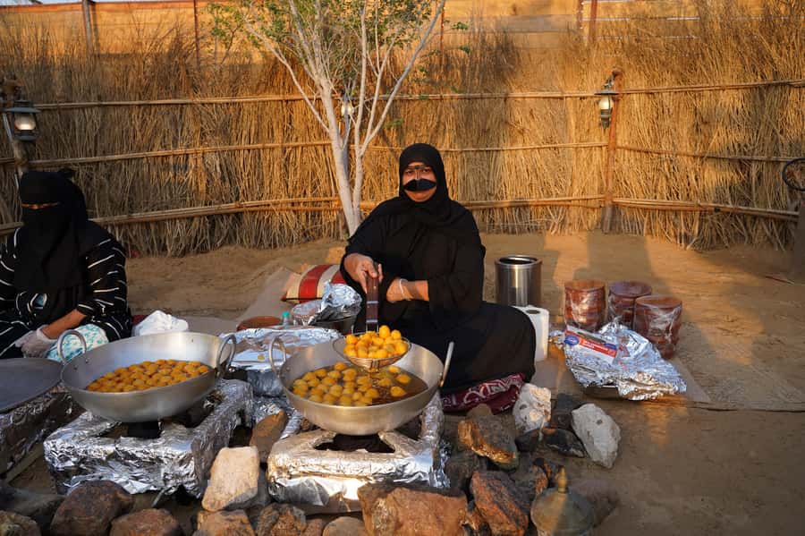 Dubai: Red Dunes Quad Bike with Sandboarding, Camels and BBQ - BBQ dinner with plenty of choice