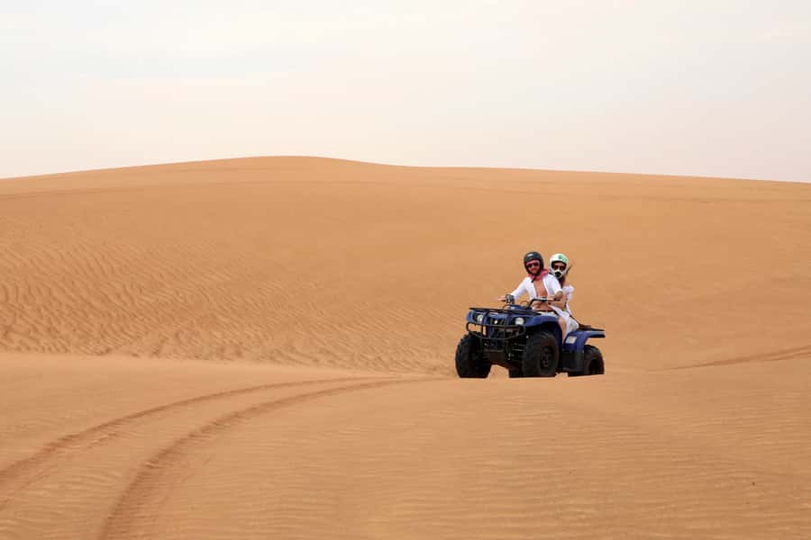 Dubai: Red Dunes Quad Bike with Sandboarding, Camels and BBQ - Timing, heat, and the best season for comfort