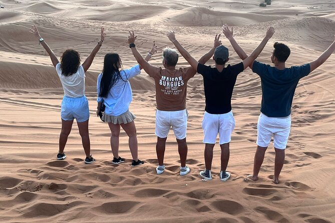 Dubai Red Dunes Safari, ATV, Camel ride, BBQ at Desert Camp - BBQ dinner, Tanura, fire, and belly dance